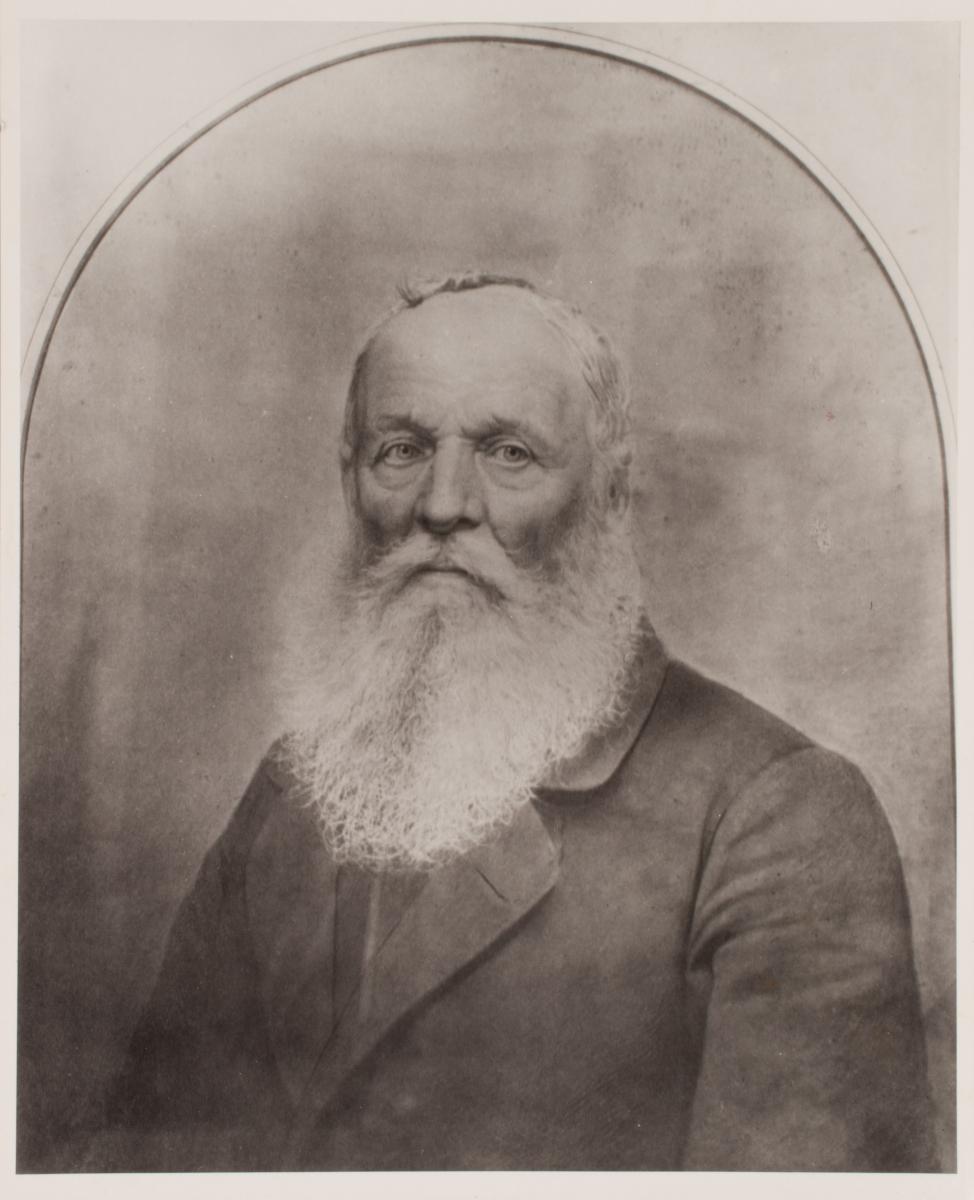 A picture of a man with a flowing beard.